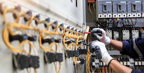 Professional Electrician technician working in Pelican Marsh, FL